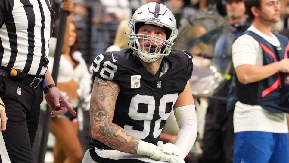 Nov 13, 2022; Paradise, Nevada, USA; Las Vegas Raiders defensive end Maxx Crosby (98) watches a replay after making a tackle against the Indianapolis Colts during the first half at Allegiant Stadium. Mandatory Credit: Stephen R. Sylvanie-USA TODAY Sports