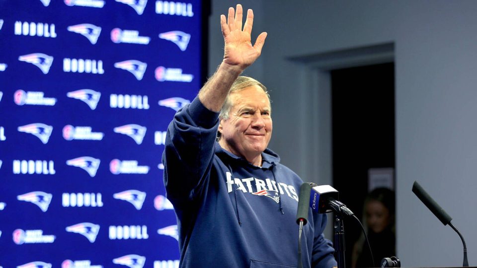Foxborough, MA - May 31: A smiling Bill Belichick greets the media with a wave after an off-season practice for his New England Patriots. (Photo by John Tlumacki/The Boston Globe via Getty Images)