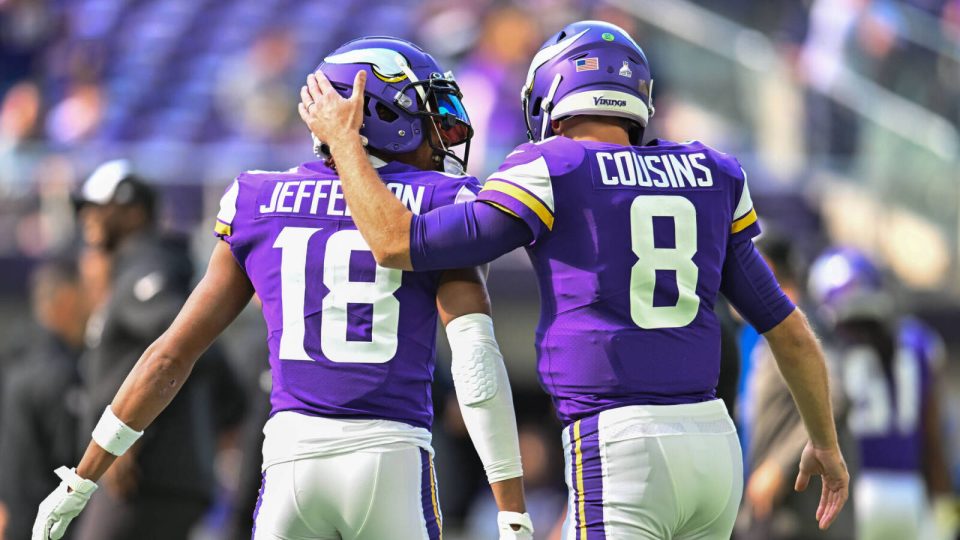 Oct 9, 2022; Minneapolis, Minnesota, USA; Minnesota Vikings wide receiver Justin Jefferson (18) and quarterback Kirk Cousins (8) warm up before the game against the Chicago Bears at U.S. Bank Stadium. Mandatory Credit: Jeffrey Becker-USA TODAY Sports