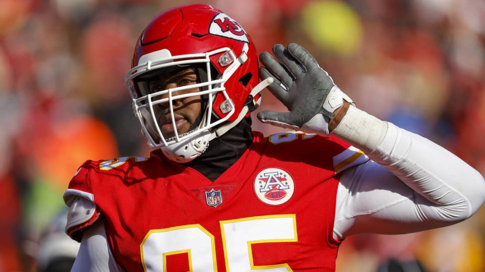 KANSAS CITY, MO - DECEMBER 24: Chris Jones #95 of the Kansas City Chiefs reacts after assisting on a quarterback sack during the second quarter against the Seattle Seahawks at Arrowhead Stadium on December 24, 2022 in Kansas City, Missouri. (Photo by David Eulitt/Getty Images)