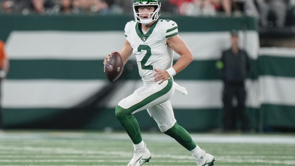 New York Jets quarterback Zach Wilson (2) runs with the ball during the first half of an NFL football game against the Kansas City Chiefs on Sunday Oct. 1, 2023, in East Rutherford, NJ. (AP Photo/Bryan Woolston)