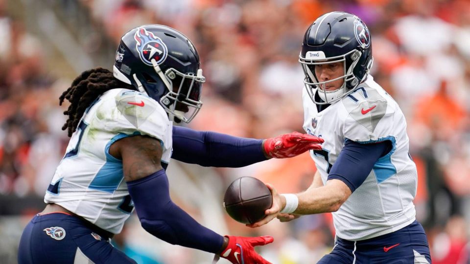Tennessee Titans quarterback Ryan Tannehill (17) hands off to running back Derrick Henry (22) against the Cleveland Browns during the third quarter in Cleveland, Ohio, Sunday, Sept. 24, 2023.