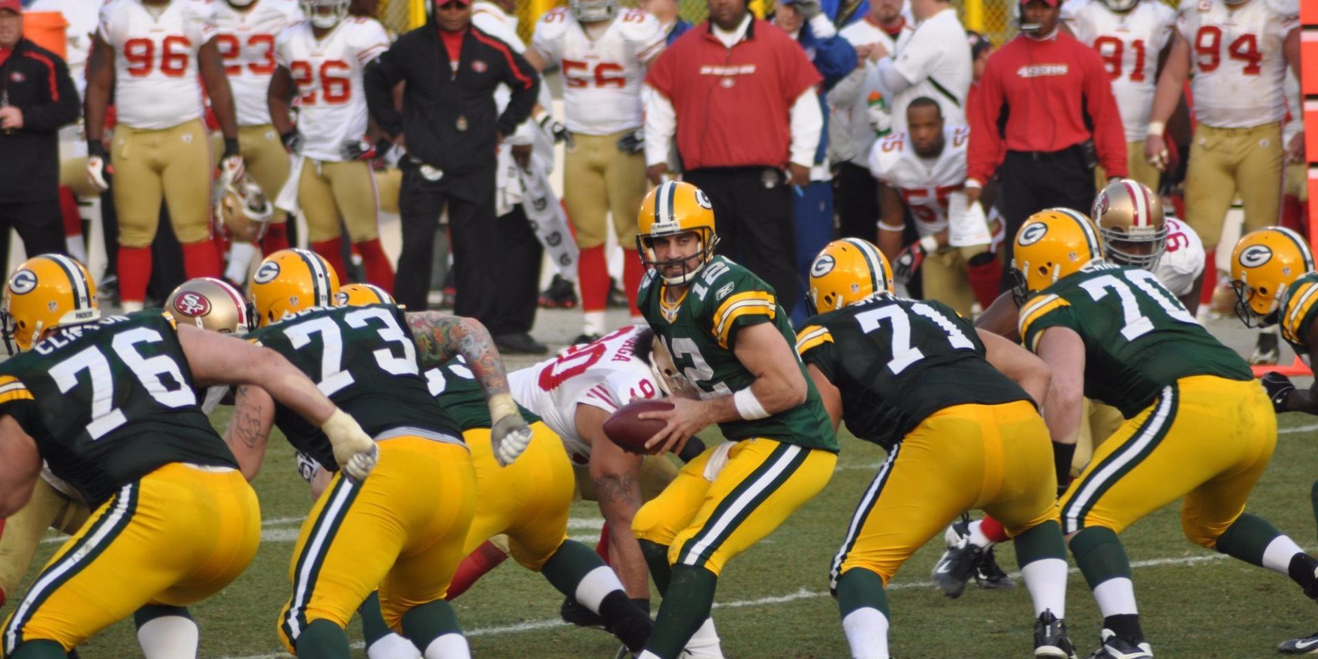 Green Bay Packers quarterback Aaron Rodgers takes the snap in a game at Lambeau Field against the San Francisco 49ers on November — Photo by herreid